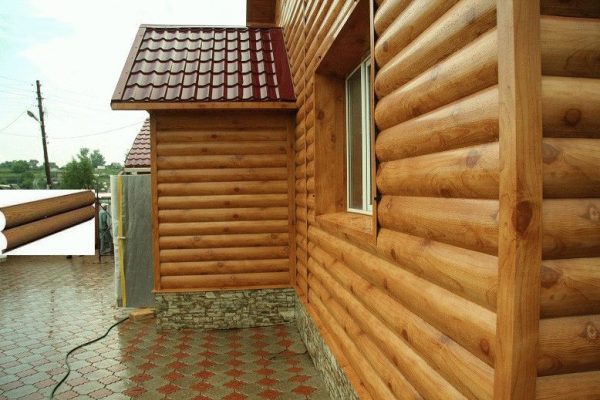 Монтаж металосайдингу під колоду з точним підганянням панелей