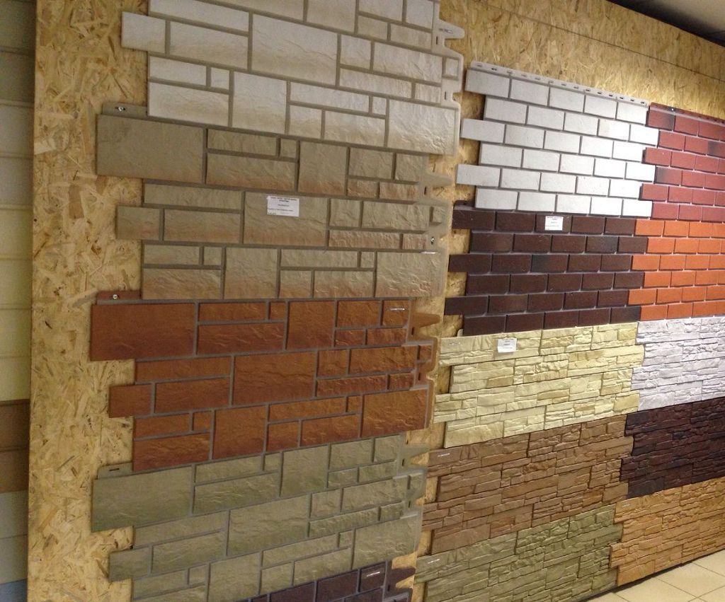 Фасадні панелі під камінь