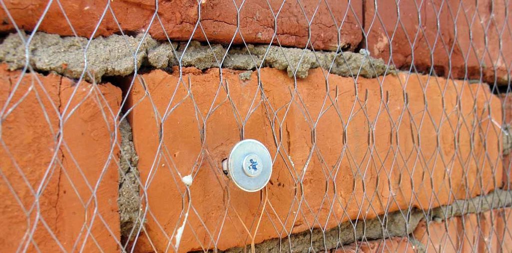 Кріплення до цегляної кладки за допомогою саморіза з широкою шайбою