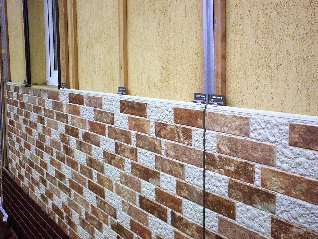 Фіброцементні плити кріпляться за допомогою хомутів або фасадних шурупів