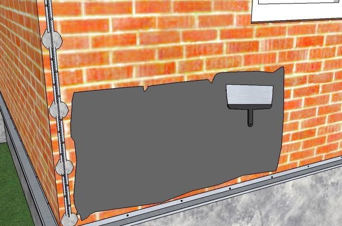 Нанесіть тонкий шар клею на заґрунтовану стіну