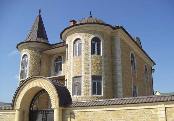 Облицювання піщаником та фасадною плиткою