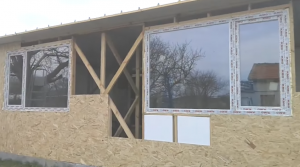 Процес обшивки. Встановлені вікна